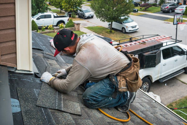 Professional Roof Replacement technician working in Linden, CA